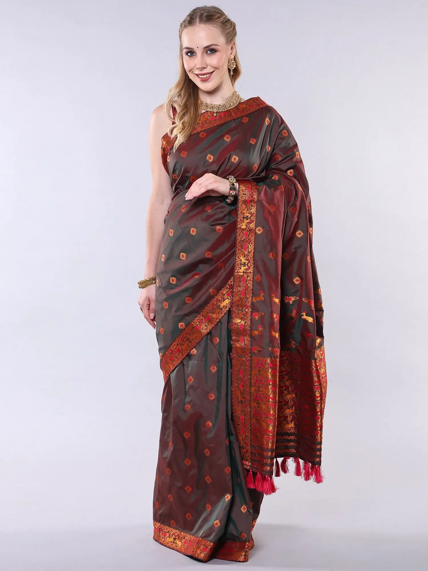 Ivy-Green Iridescent Dhoop Chaanv Muga Saree from Assam with Copper Colored Thread woven Animals and Patch Border