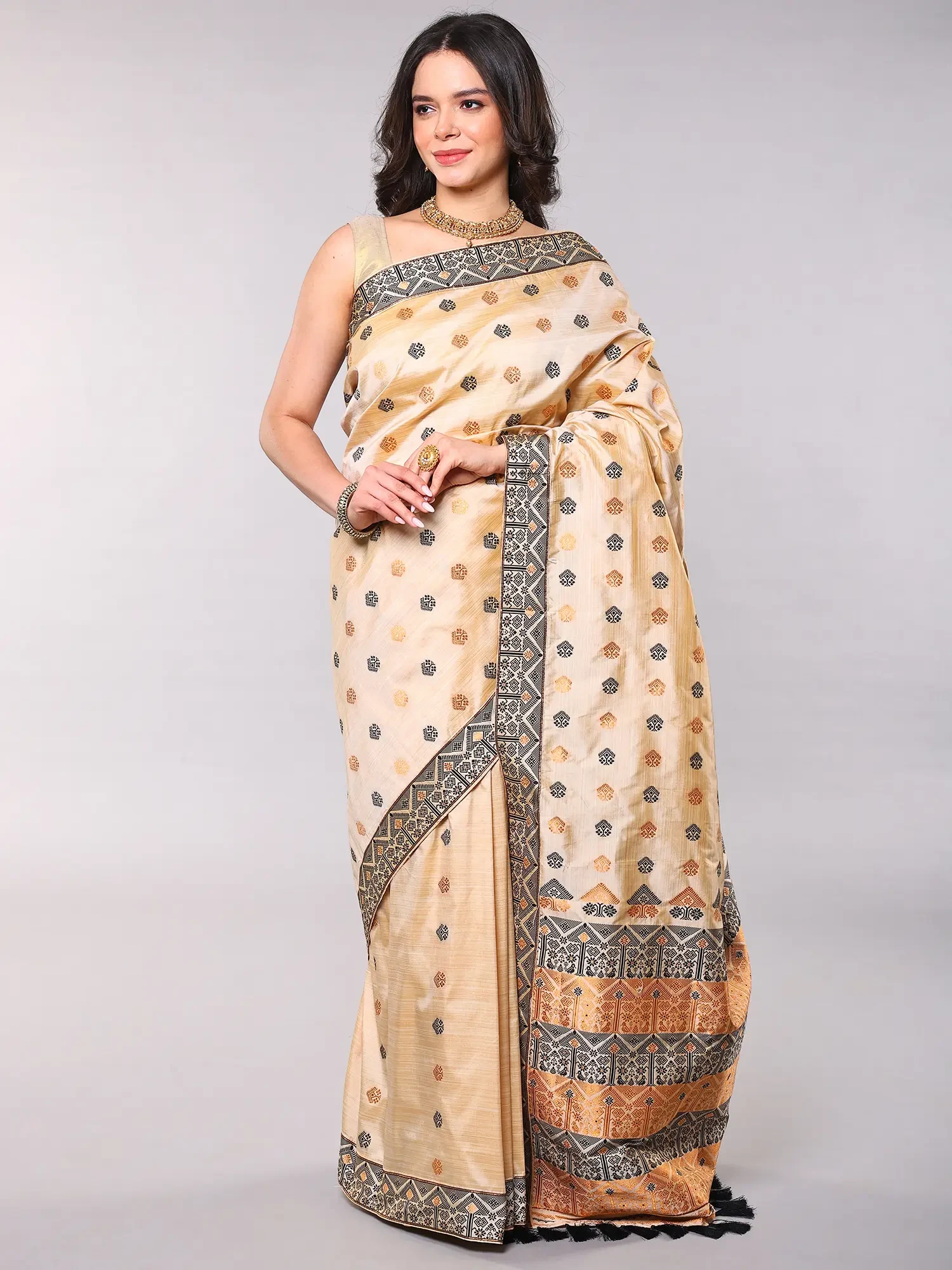 Brazilian-Sand Assamese Muga Saree with Woven Traditional Motifs and Patch Border