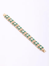 Geometric Kundan Bracelet with Green and Red Stones in Brass