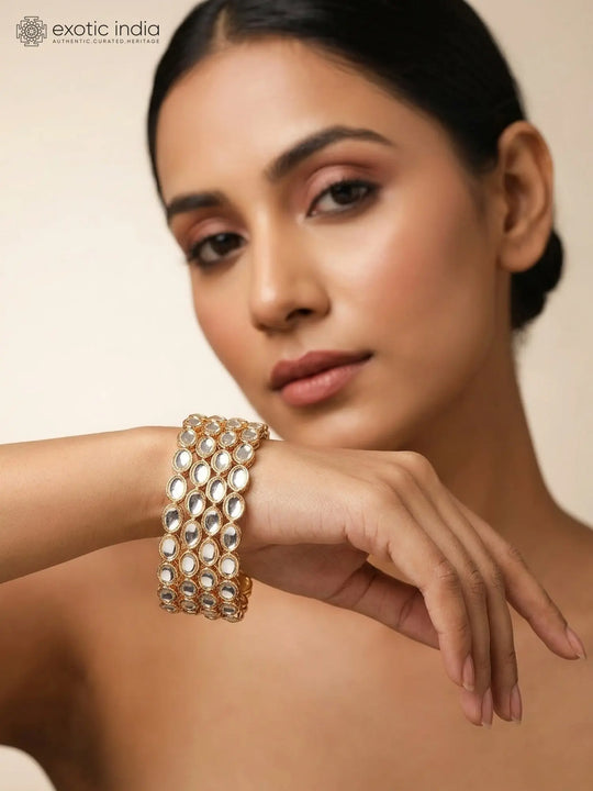 Oval Polki Stone Studded Gold Tone Brass Bangles Set of 4