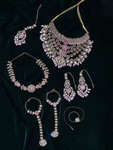 Kundan Bridal Jewellery Set with Pearl Drops in Red and Green