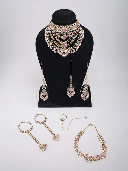 Kundan Bridal Jewellery Set with Pearl Drops in Red and Green
