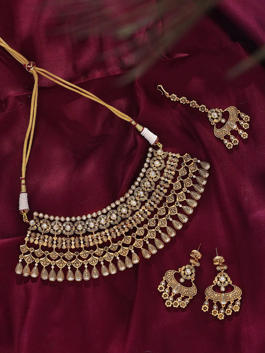 Polki Studded Brass Choker Set with Earrings and Maang Tikka