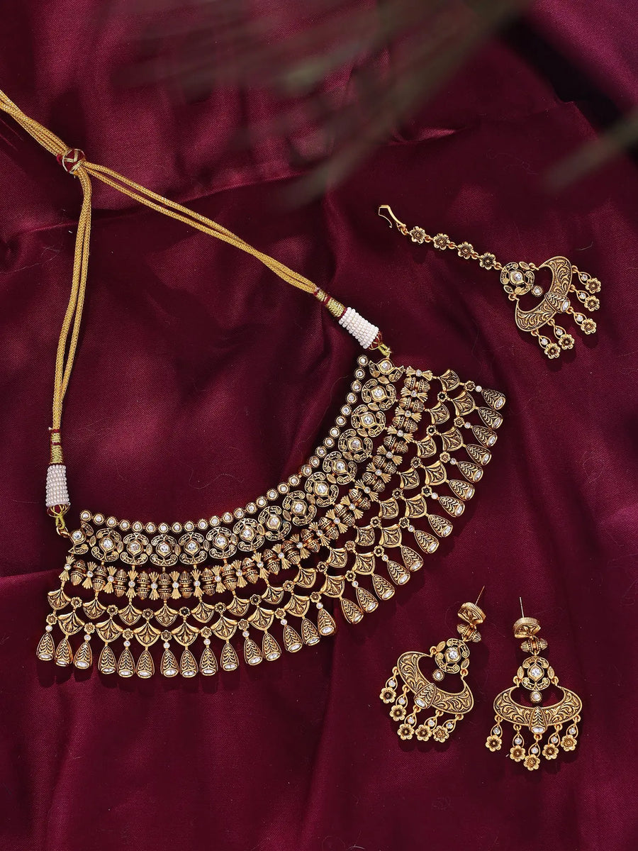 Polki Studded Brass Choker Set with Earrings and Maang Tikka