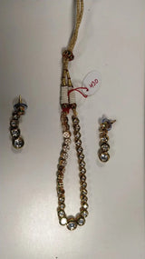 Polki Stone Brass Necklace and Earrings Set