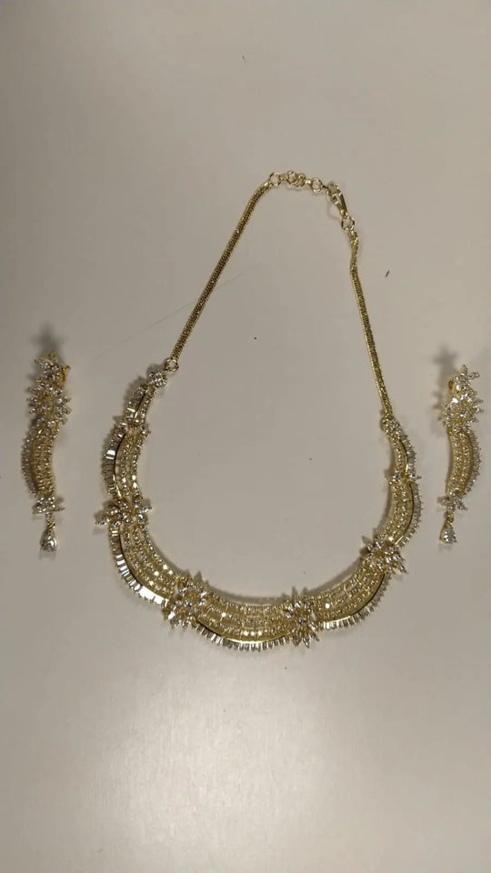 Layered Floral Stone Studded Brass Necklace Set in Gold