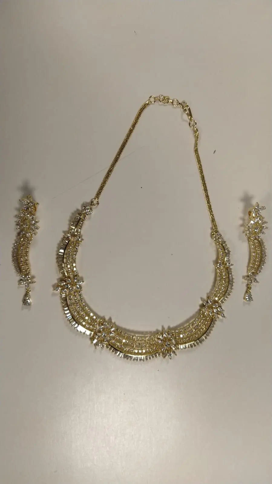 Layered Floral Stone Studded Brass Necklace Set in Gold