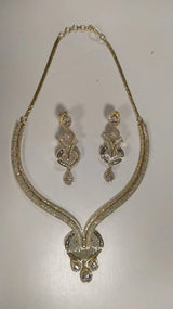 Stone Studded Brass Choker and Earring Set in Gold and Silver