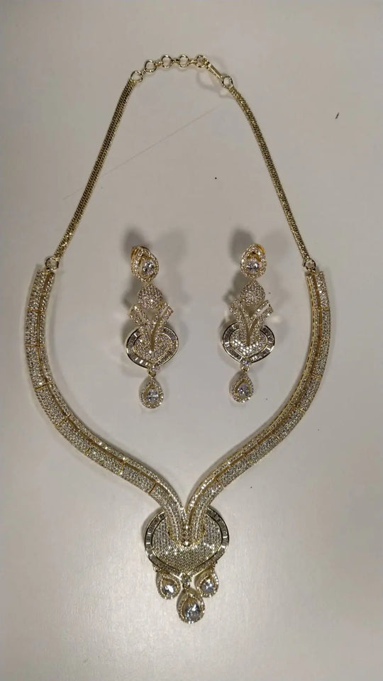 Stone Studded Brass Choker and Earring Set in Gold and Silver