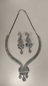 Stone Studded Brass Choker and Earring Set in Gold and Silver