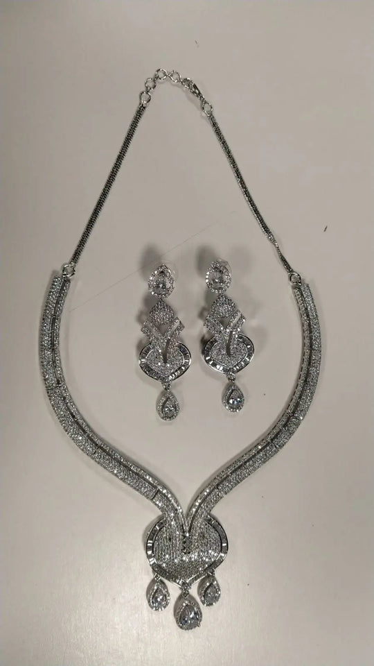 Stone Studded Brass Choker and Earring Set in Gold and Silver