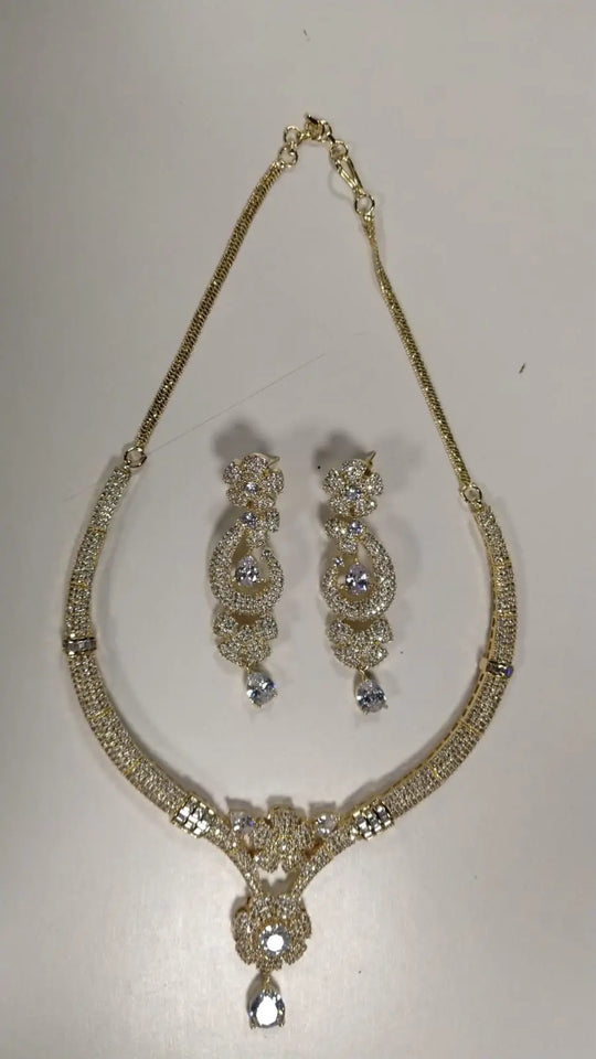 Floral Stone Studded Gold Tone Brass Choker and Earring Set