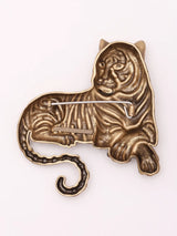 Seated Tiger Green Eye Brass Brooch