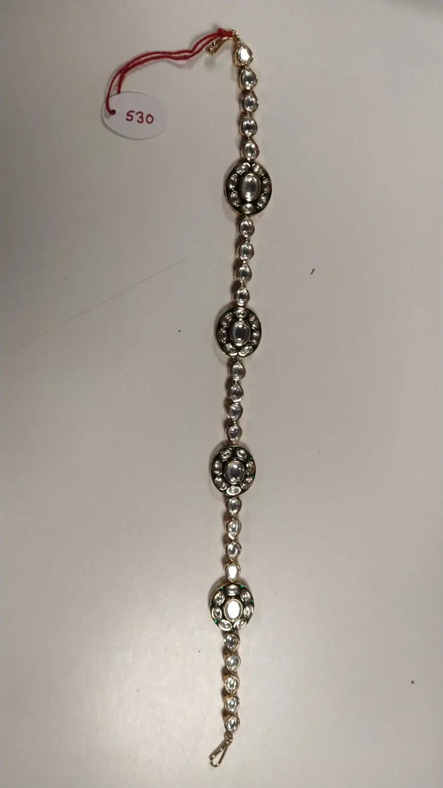 Chakra Motif Kundan Brass Mathapatti