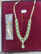 Oval Polki and Green Enamel Copper Necklace and Earrings Set
