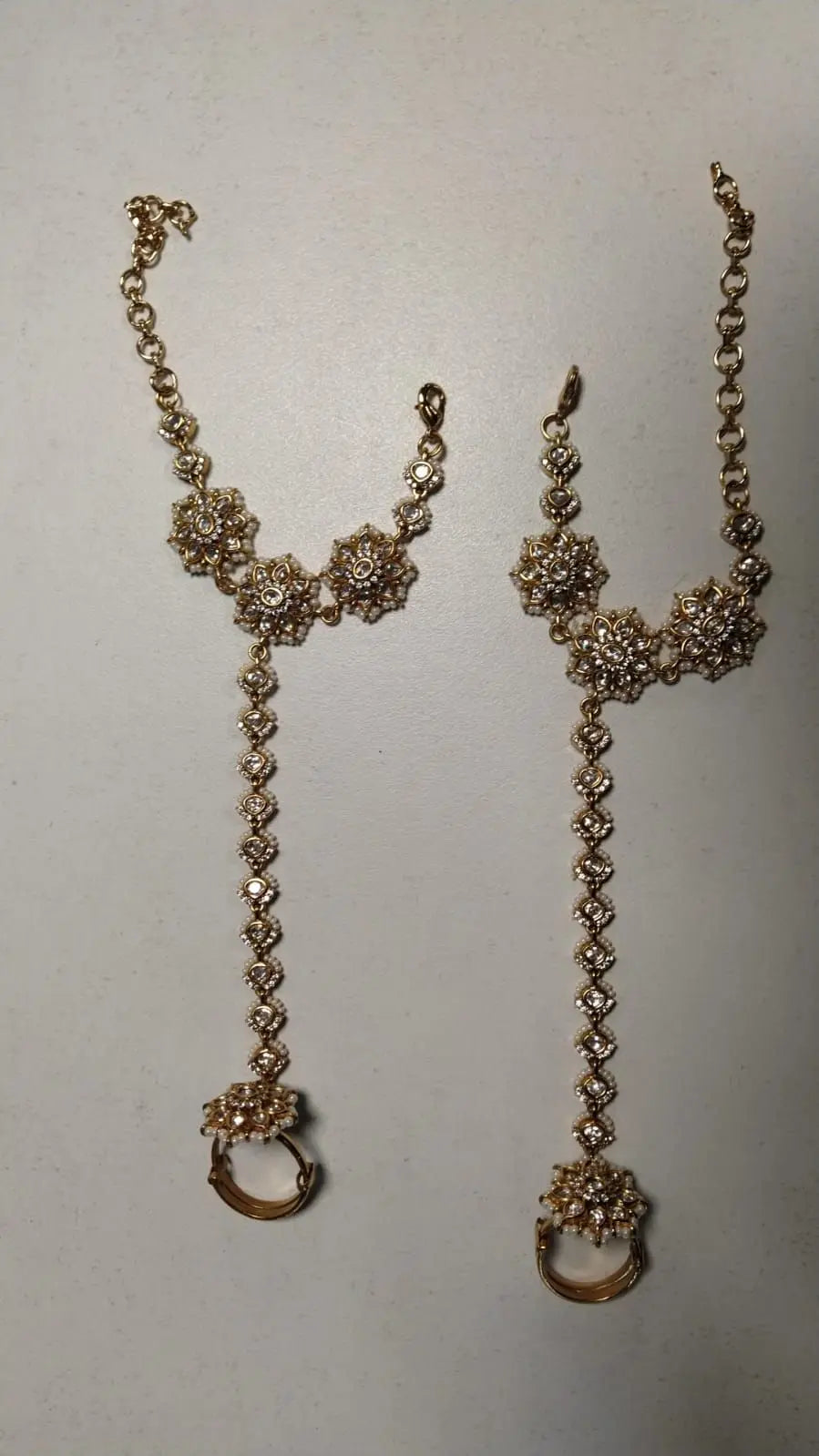 Floral Stone Studded Brass Haath Phool Bracelet