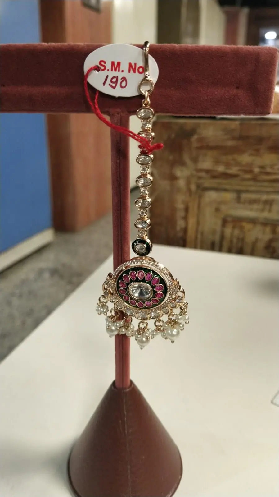 Floral Kundan Stone Studded Brass Maang Tikka