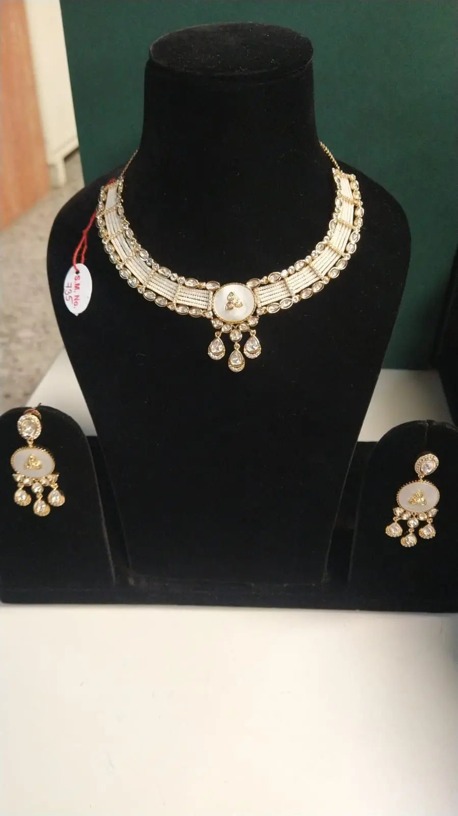 White Kundan Multi Strand Choker and Earrings Set