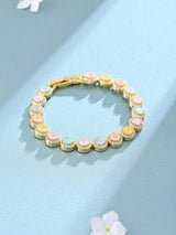 Pastel Stone Halo Tennis Bracelet in Gold Tone Brass