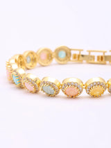 Pastel Stone Halo Tennis Bracelet in Gold Tone Brass