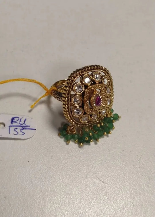 Kundan Ring with Green and Pink Stones in Brass