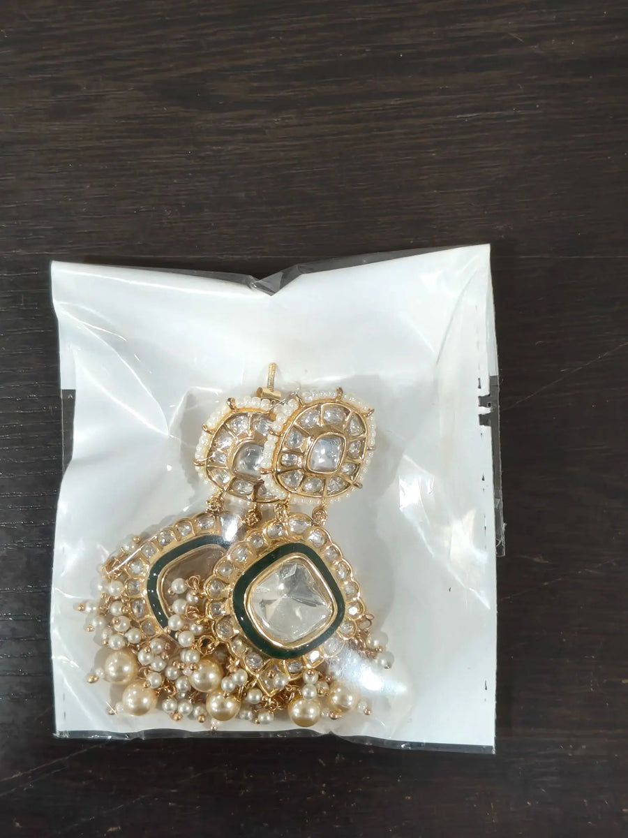 Brass Stone Studded Drop Earrings With Floral Motif