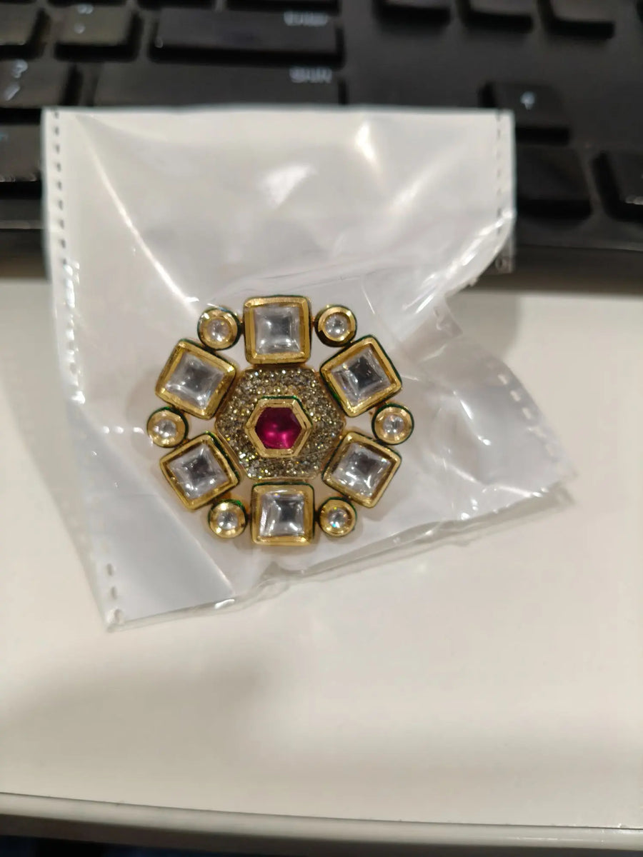 Kundan Ring with Green and Pink Stones in Brass
