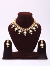 Kundan Stone Studded Brass Necklace Set with Earrings