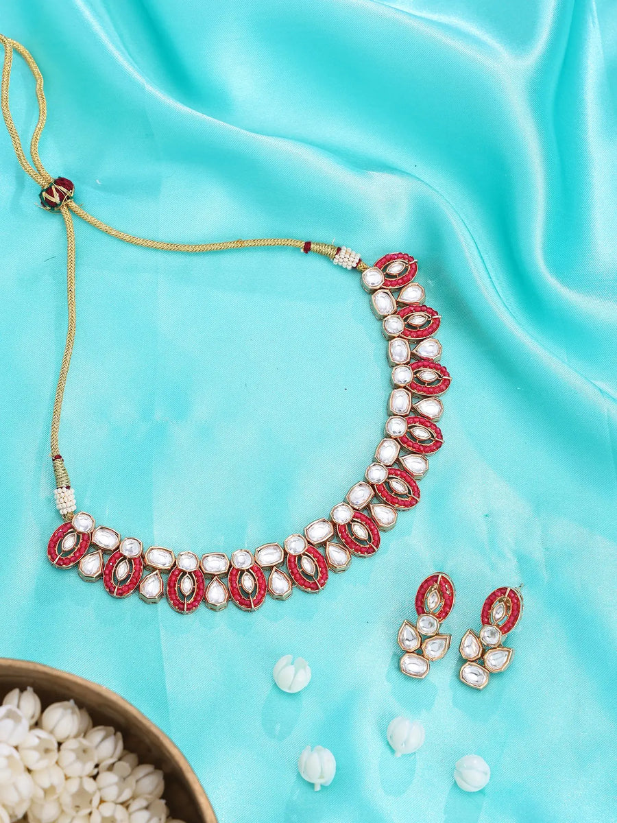 Oval Red Kundan Necklace and Earrings Set in Brass
