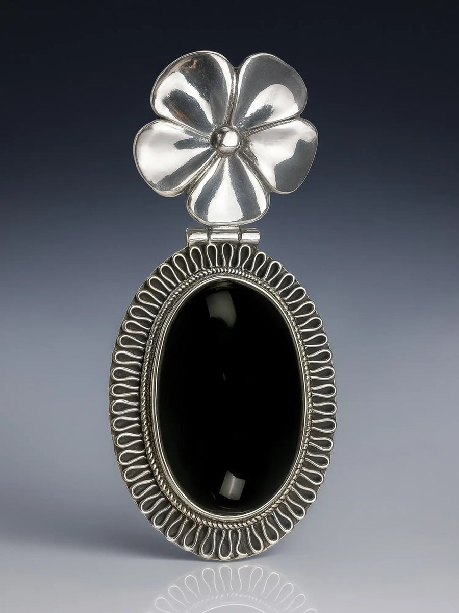 Black Onyx Oval Pendant with Floral Bale in Sterling Silver