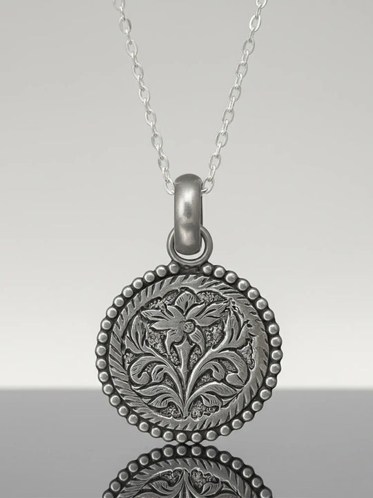 Carved Floral Sterling Silver Pendant