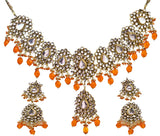 Kundan Necklace Set with Orange Beads in Copper Alloy