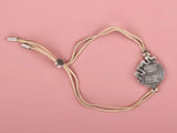 Charan Paduka Motif Sterling Silver Bracelet
