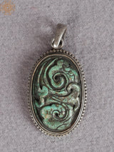 Silver Figurine Pendant with Emerald Stone
