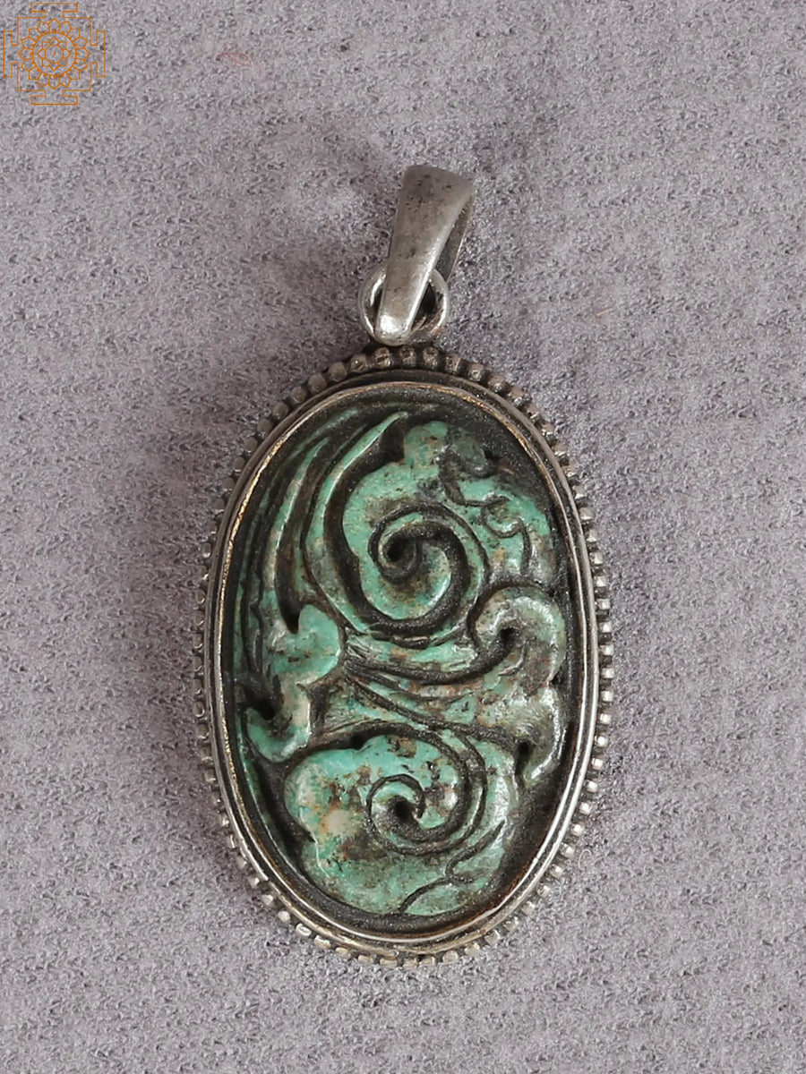Silver Figurine Pendant with Emerald Stone
