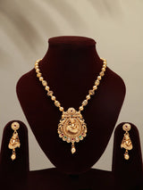 Bal Krishna and Cow Stone Studded Brass Necklace and Earrings Set