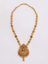 Bal Krishna and Cow Stone Studded Brass Necklace and Earrings Set