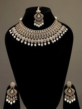 Ivory and Gold Stone Studded Brass Necklace Set with Earrings and Maang Tikka