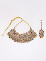 Multicolour Stone Studded Brass Choker Necklace Set with Earrings and Maang Tikka