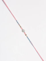 Stone Studded and Beaded Thread and Metal Rakhi Bracelet