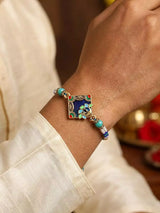 Meenakari Peacock Beaded Thread and Metal Rakhi Bracelet