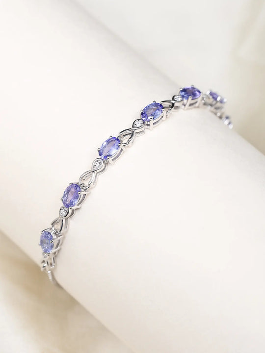 Faceted Tanzanite and White Topaz Sterling Silver Bracelet
